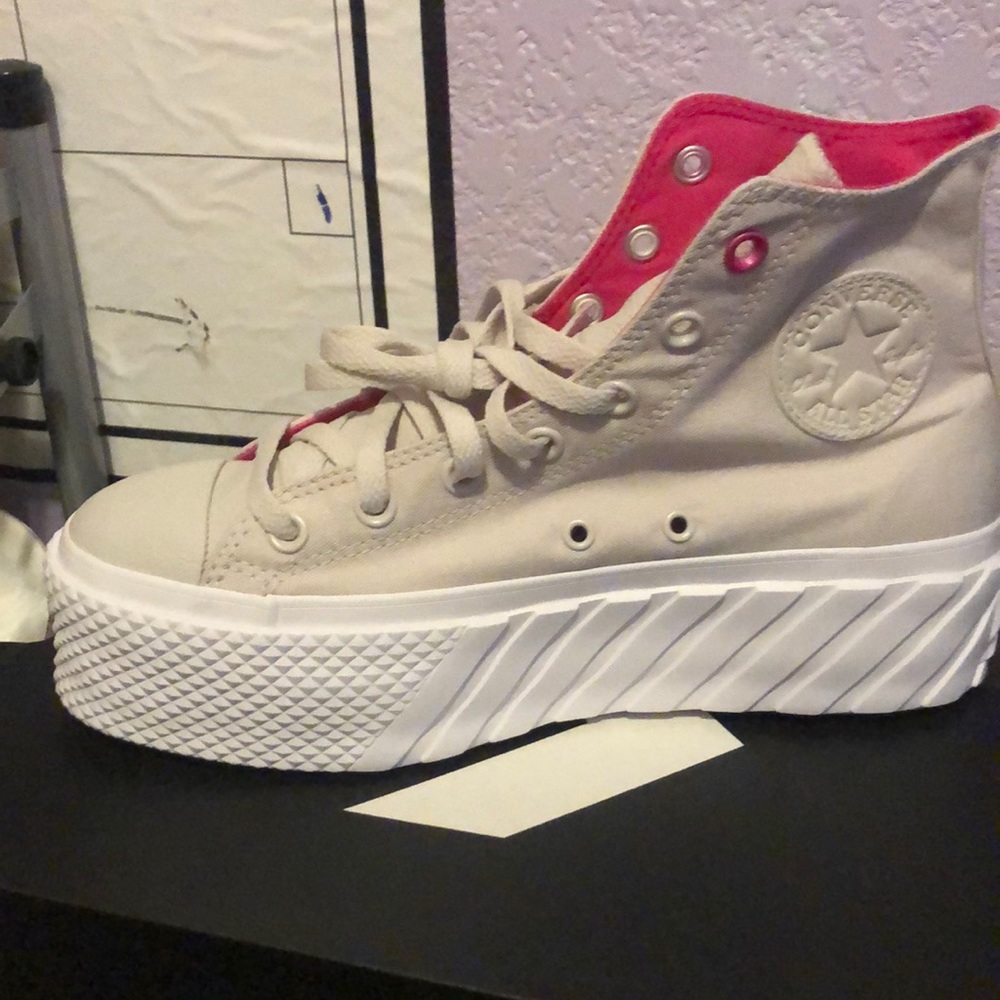 Cream colored converse platform shoes